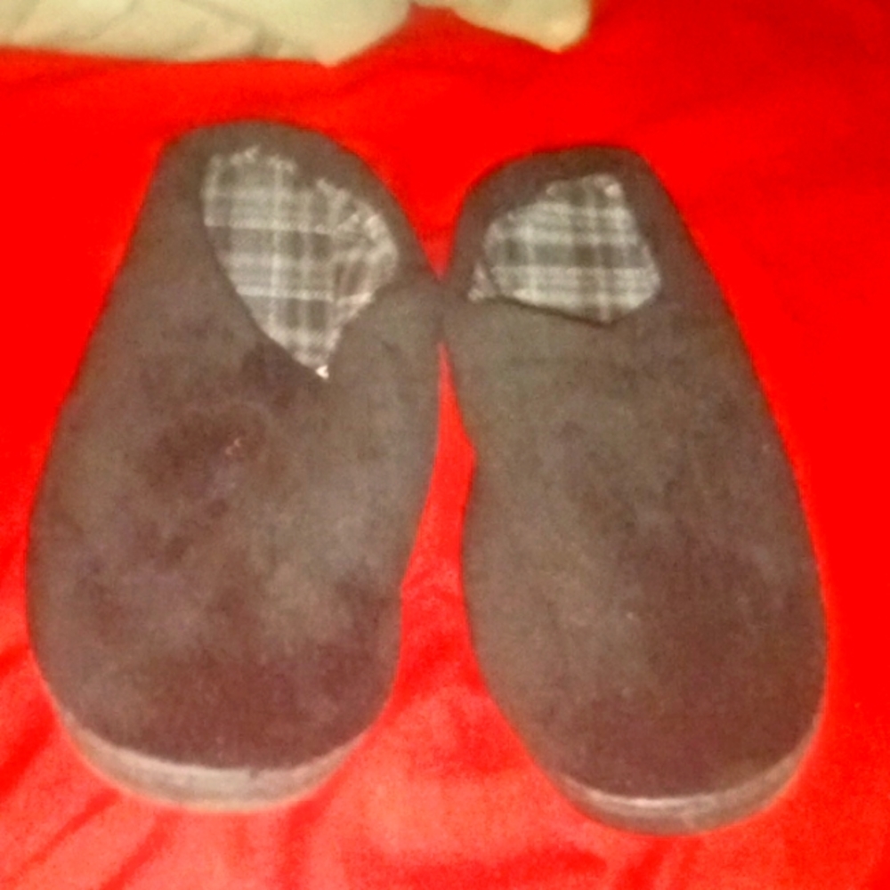 A pair of extra large slippers